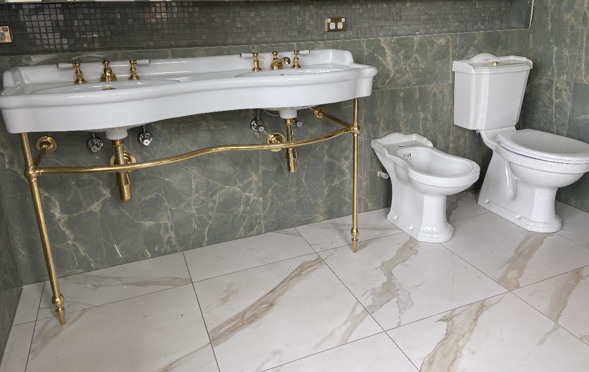 Heritage-style brass double-vanity ensuite