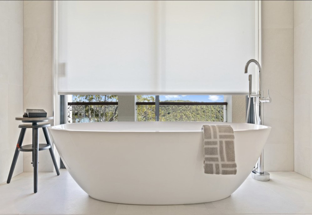 Freestanding bath with coastal bushland view, detail